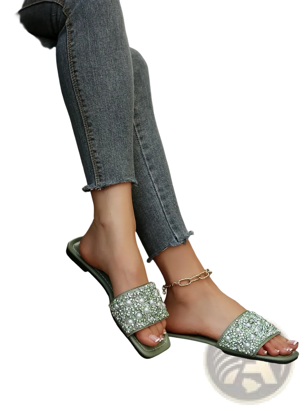 Green rhinestone flat slide sandals featuring a sparkling beaded strap for stylish casual wear