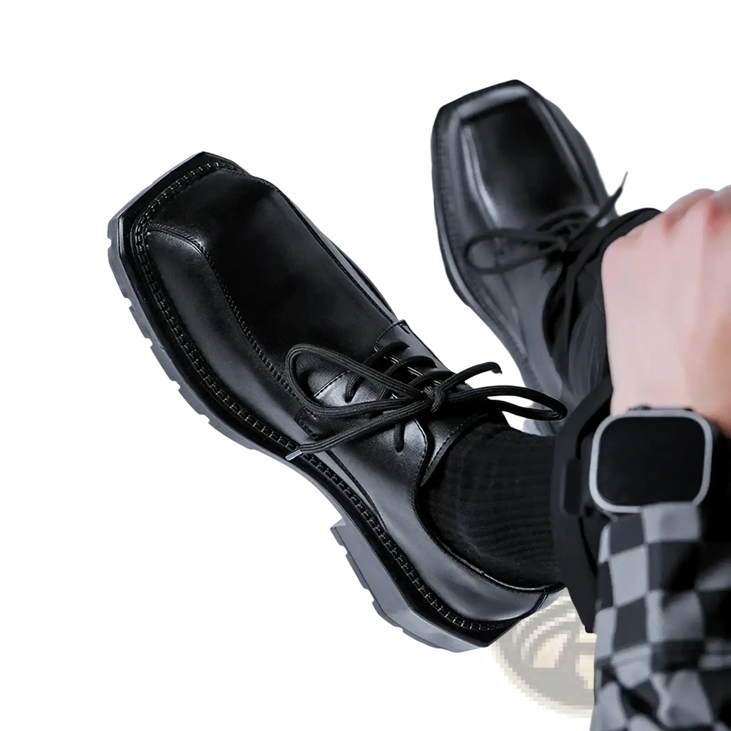 Black leather green sole leather casual shoes featuring lace-up oxford design with chunky sole and stitched detailing
