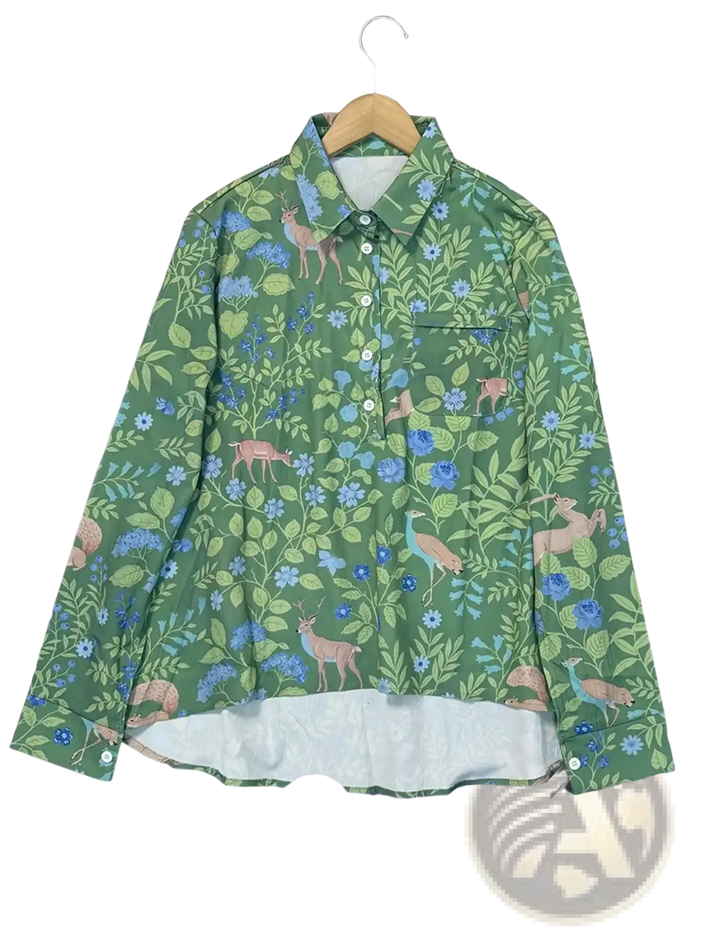 Green woodland print long sleeve shirt featuring a deer, blue flowers, and leaves pattern on a button-up fabric