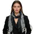 Grey jacquard polyester winter long scarf for women with textured gradient gray and black fabric and frayed edges