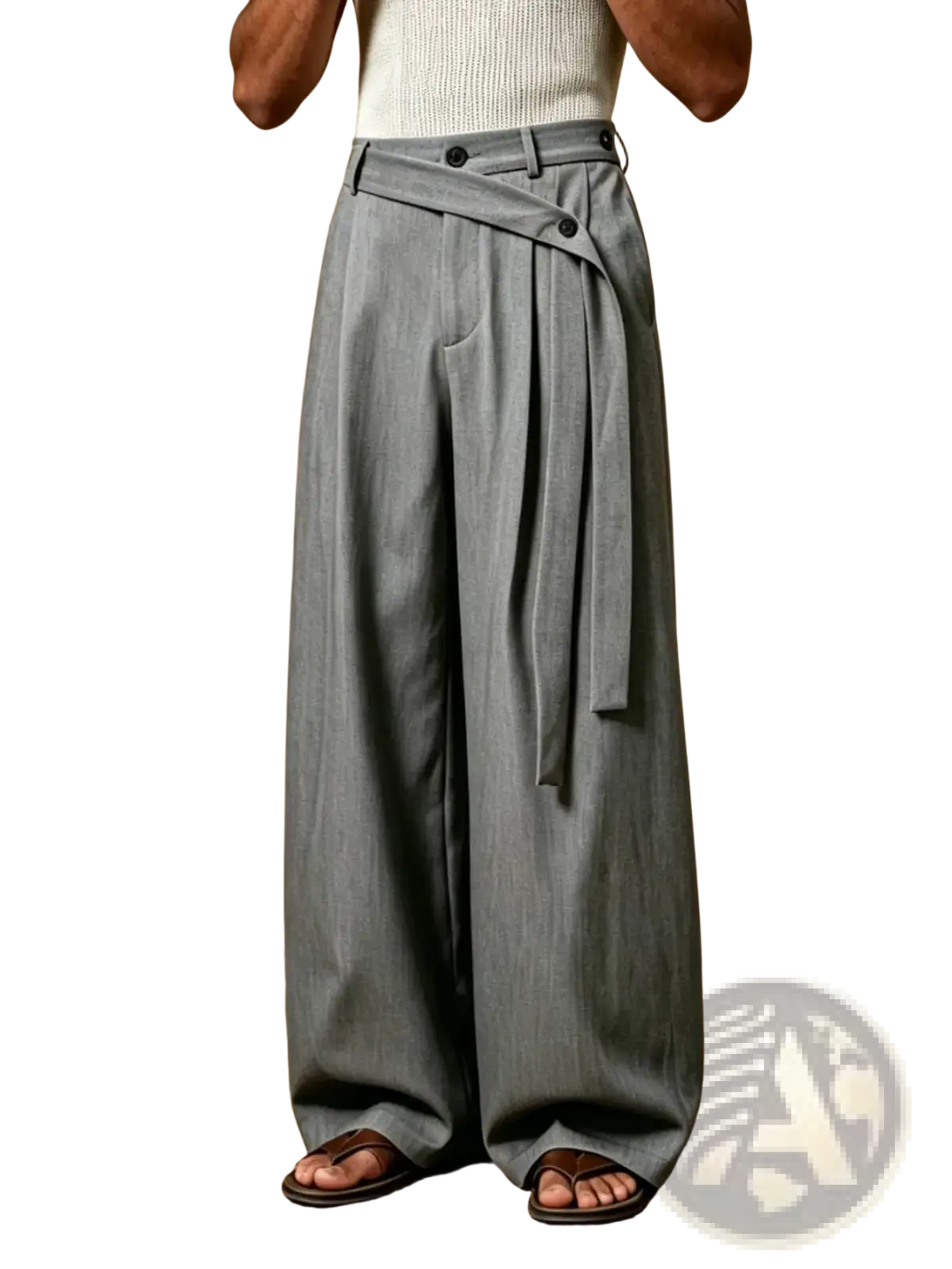 Grey wide leg belted suit trousers featuring a buttoned waistband and subtle vertical ribbing in a soft fabric