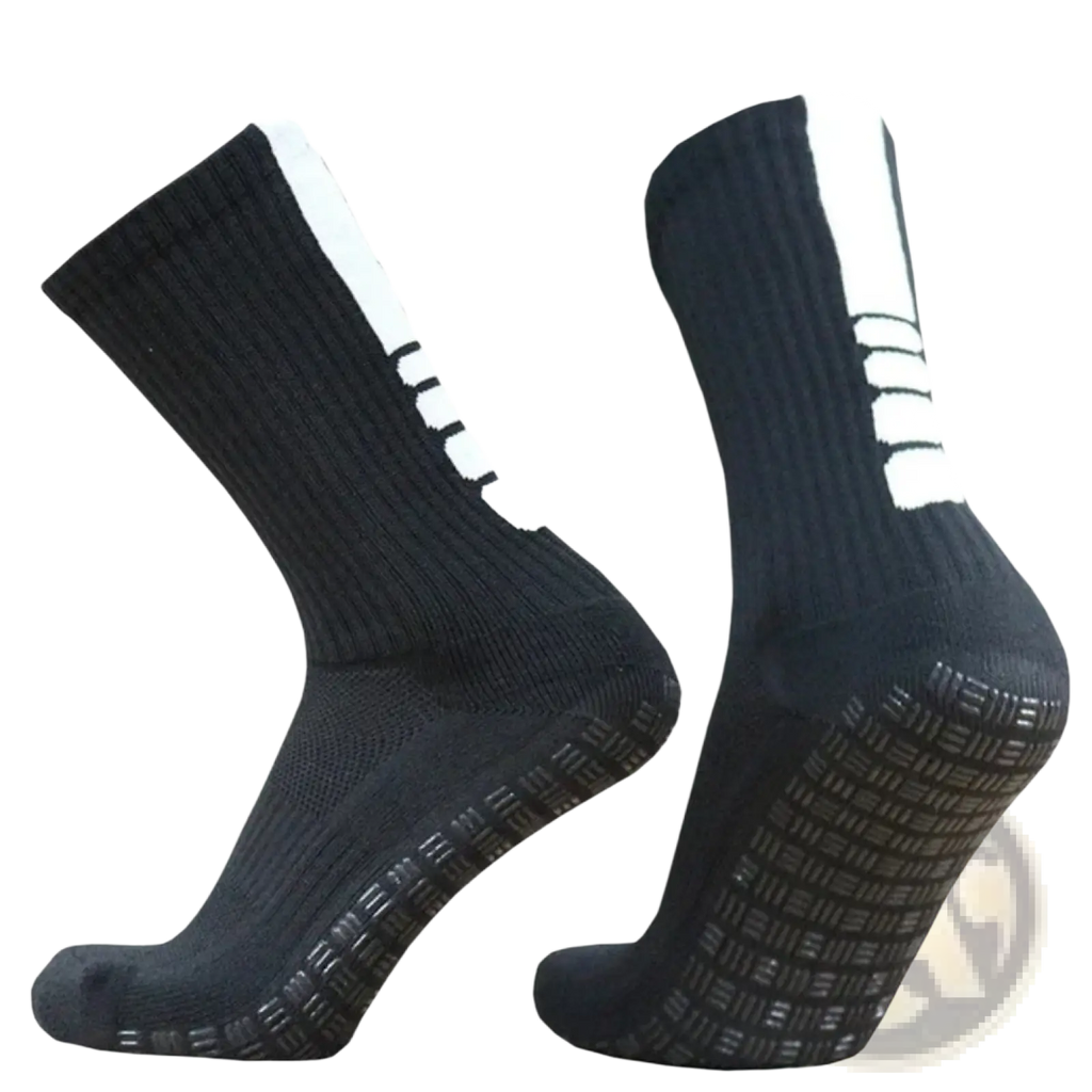 Black grip soccer socks with white side stripes and textured non slip soles designed for athletic use