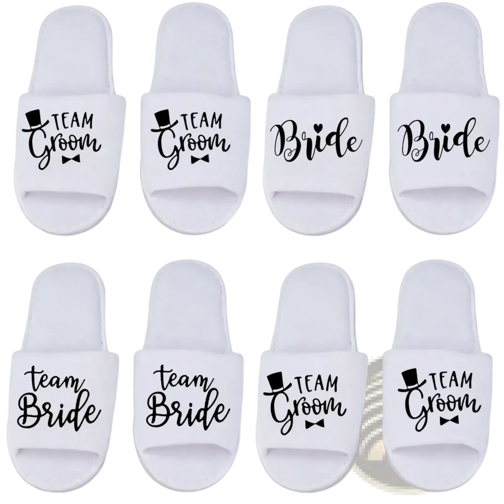 White slip-on grooming slide slippers with black team groom and bride text for wedding party footwear