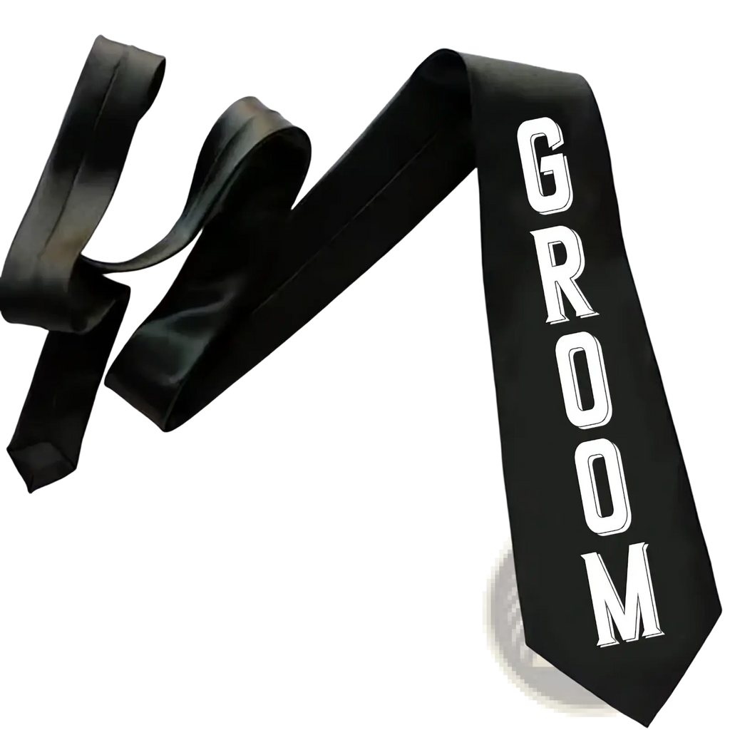 Black satin groom sash with bold white lettering from the groom tie and sash wedding set