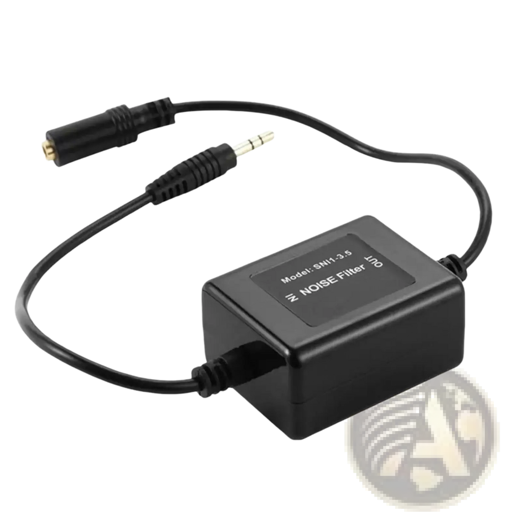 Black ground loop noise isolator with rectangular audio filter featuring gold 3.5mm male and black female connectors