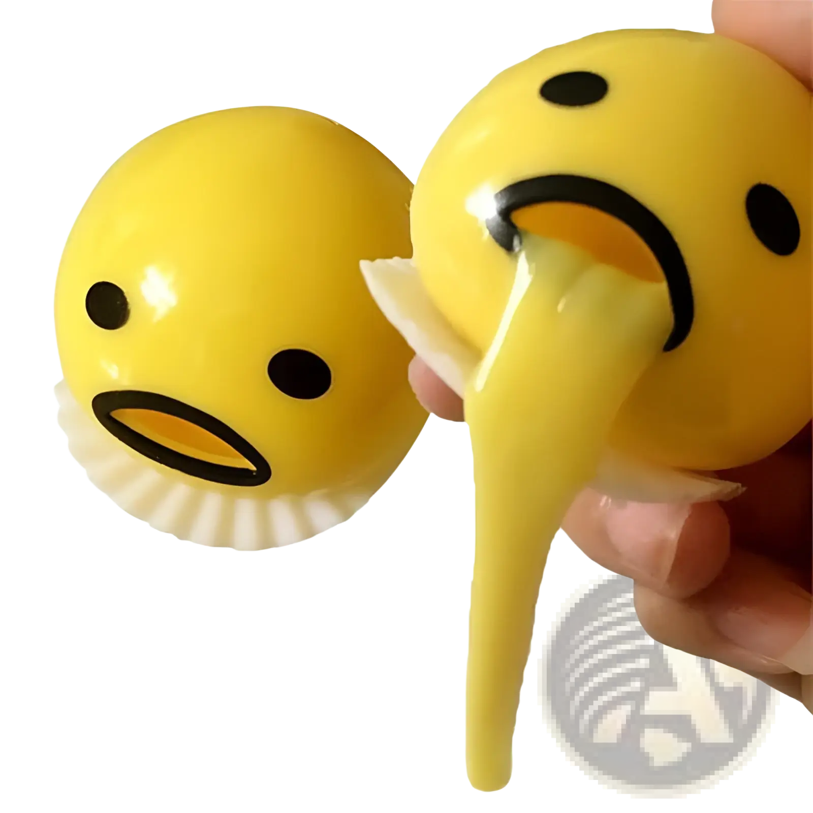 Yellow gudetama vomiting egg yolk stress relief toy with black facial features and gooey stretchy interior stress ball