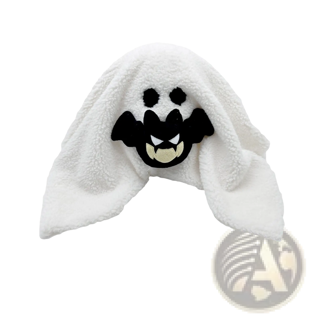 White plush ghost towel with black embroidered bat face and white teeth in gus the ghost pumpkin halloween plush pillow toy