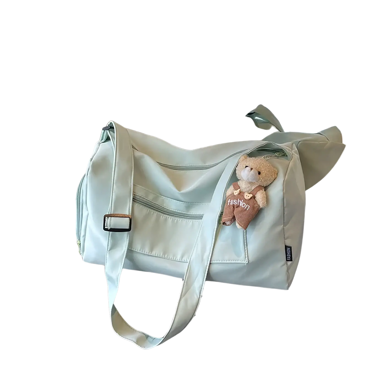 Light mint green canvas gym duffle bag with black buckle accents and plush teddy bear charm for travel use