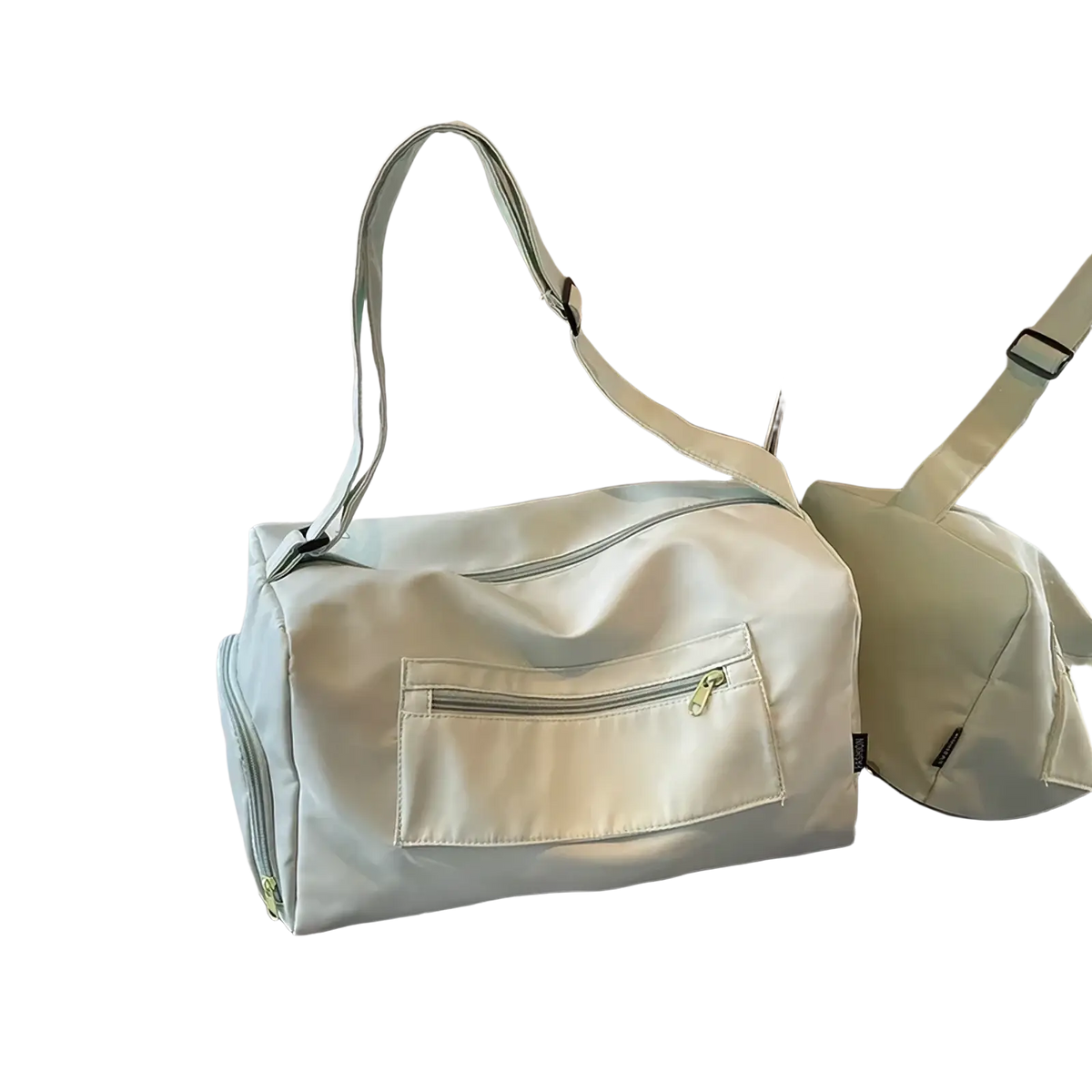 Gym duffle bag mint green made of light nylon with a front zippered pocket and adjustable shoulder strap for travel