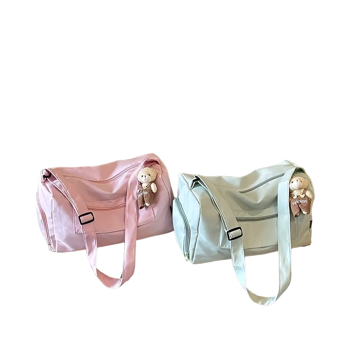 Pink and mint green gym duffle bags with plush bear charms designed for travel and pillow storage