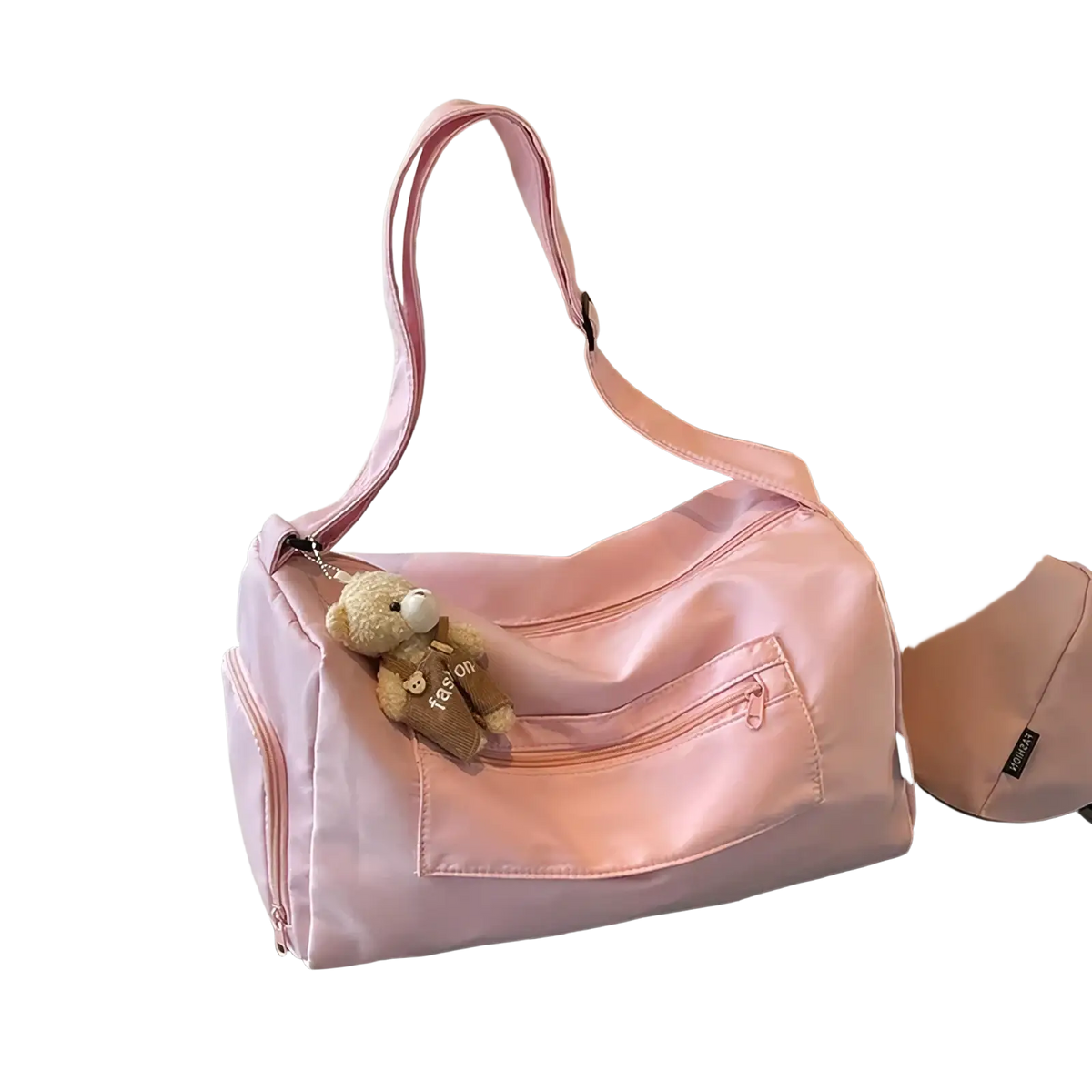Pink nylon gym duffle bag with plush teddy bear keychain suitable for travel and featuring a mint green travel pillow bag