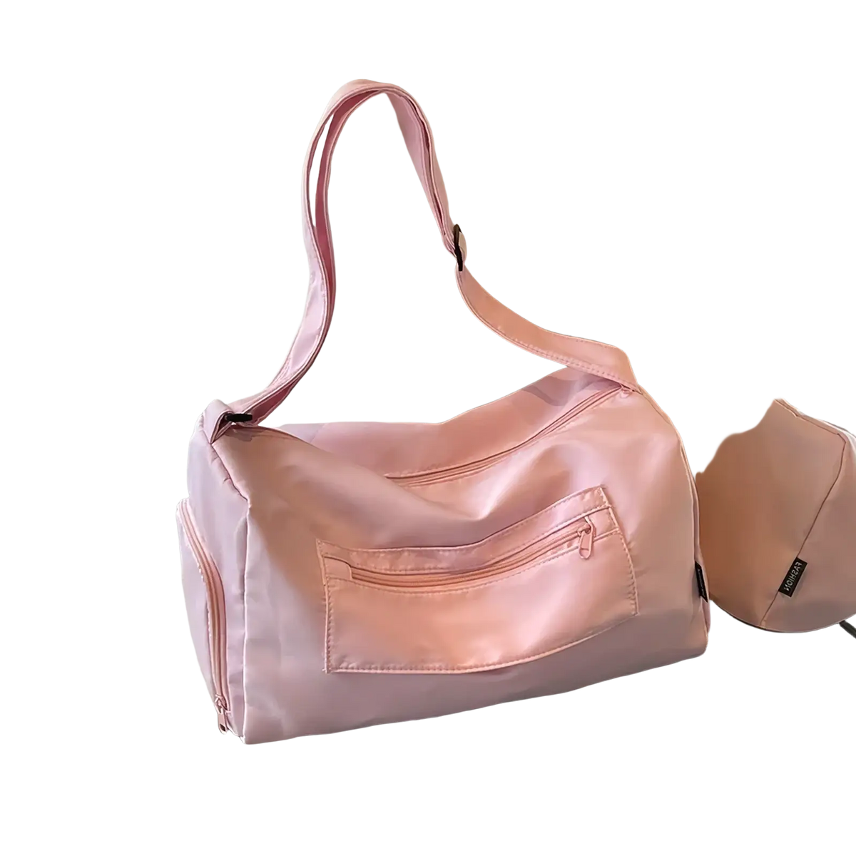 A soft pink sleek nylon gym duffle bag with adjustable shoulder strap and front zippered pocket for travel use