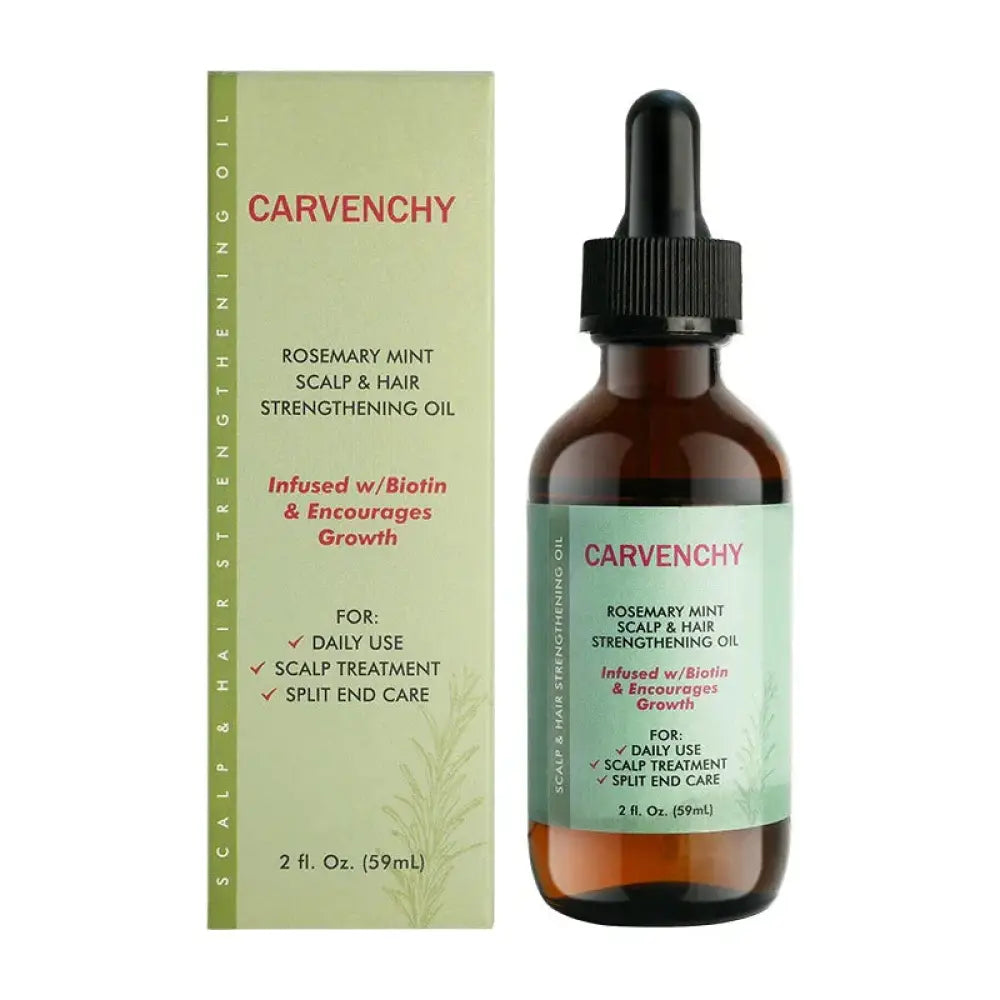 Carvenchy rosemary mint hair strengthening and growth oil in a dark amber glass bottle with black dropper cap and green label