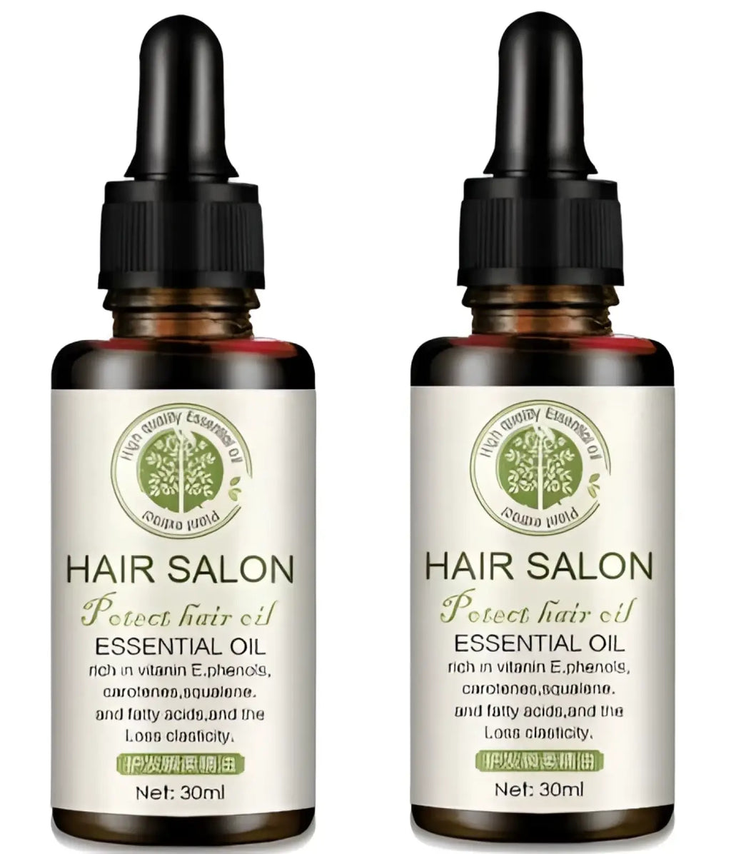 Two amber glass bottles of hair care essential oil salon protect 30ml with black dropper caps and green tree logo labels