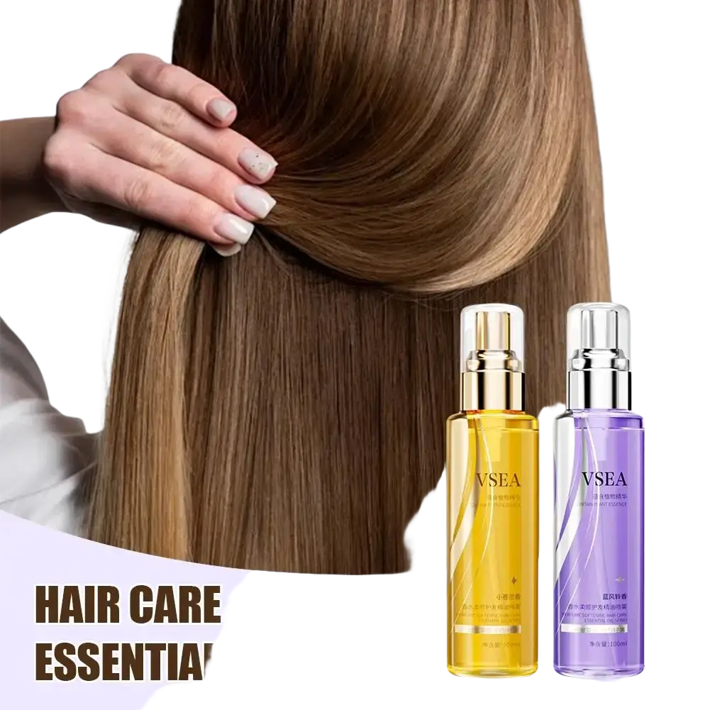 Two transparent spray bottles with gold and silver caps contain golden and purple essential oil hair care spray 100ml