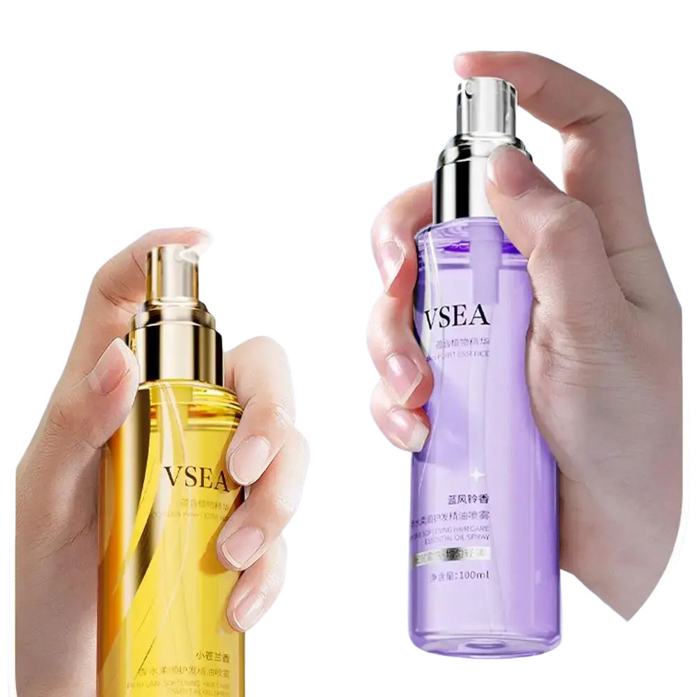 Two vsea hair care essential oil spray bottles 100ml with gold and silver-tone mist nozzles and colored liquids