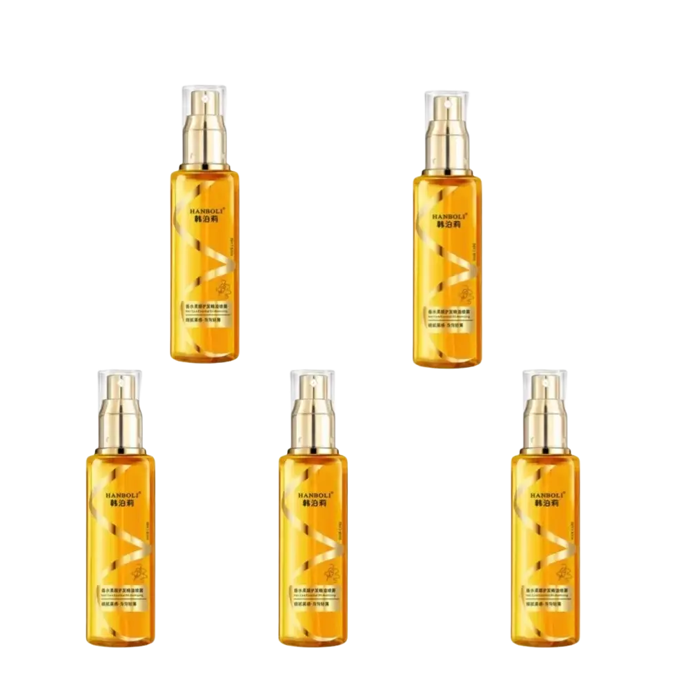 Five golden-hued transparent glass essential oil spray bottles with gold nozzles for proper hair care on dry frizzy hair