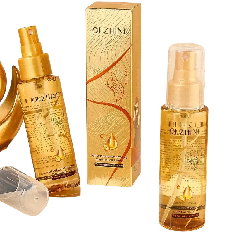 Golden-hued guzhini hair care essential oil spray in a sleek transparent bottle with gold-tone pump for luster and repair