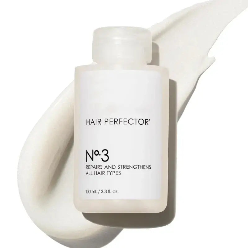 A sleek translucent hair perfector no.3 bottle with white label and clear cap for control frizz repair in hair care series