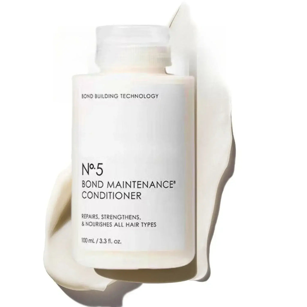 White bottle of bond no hair care series shampoo and conditioner for frizz repair split ends control frizz repair