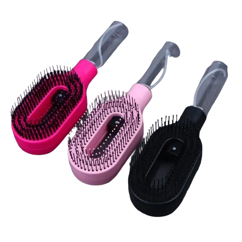 Three colorful plastic hair care detangler brushes with black bristles for dry hair available in pink light pink and black