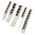 Set of five white resin hair cutting combs with black playing card suit patterns and perforated handles
