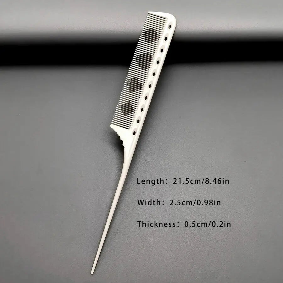 White resin hair cutting comb with fine evenly spaced teeth and tapered handle for precise styling