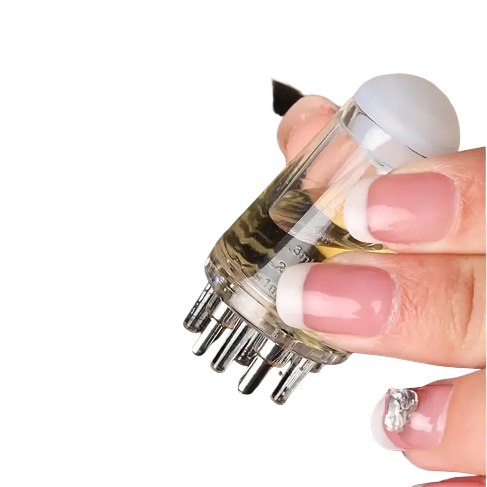 Clear glass applicator bottle with silver metallic prongs and white cap for hair growth and scalp massage use