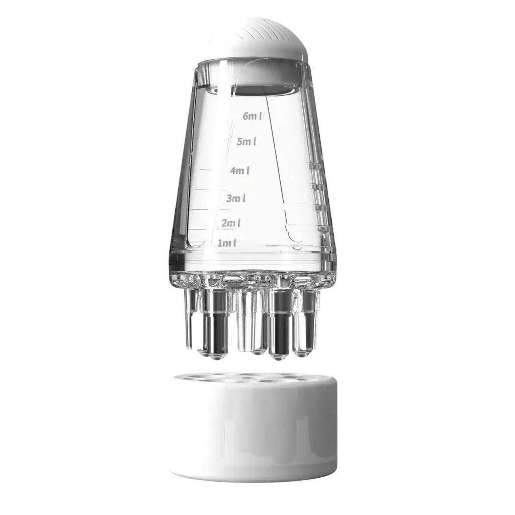 Transparent plastic applicator bottle measuring cup with white cap and base graduated from 1ml to 6ml for hair growth