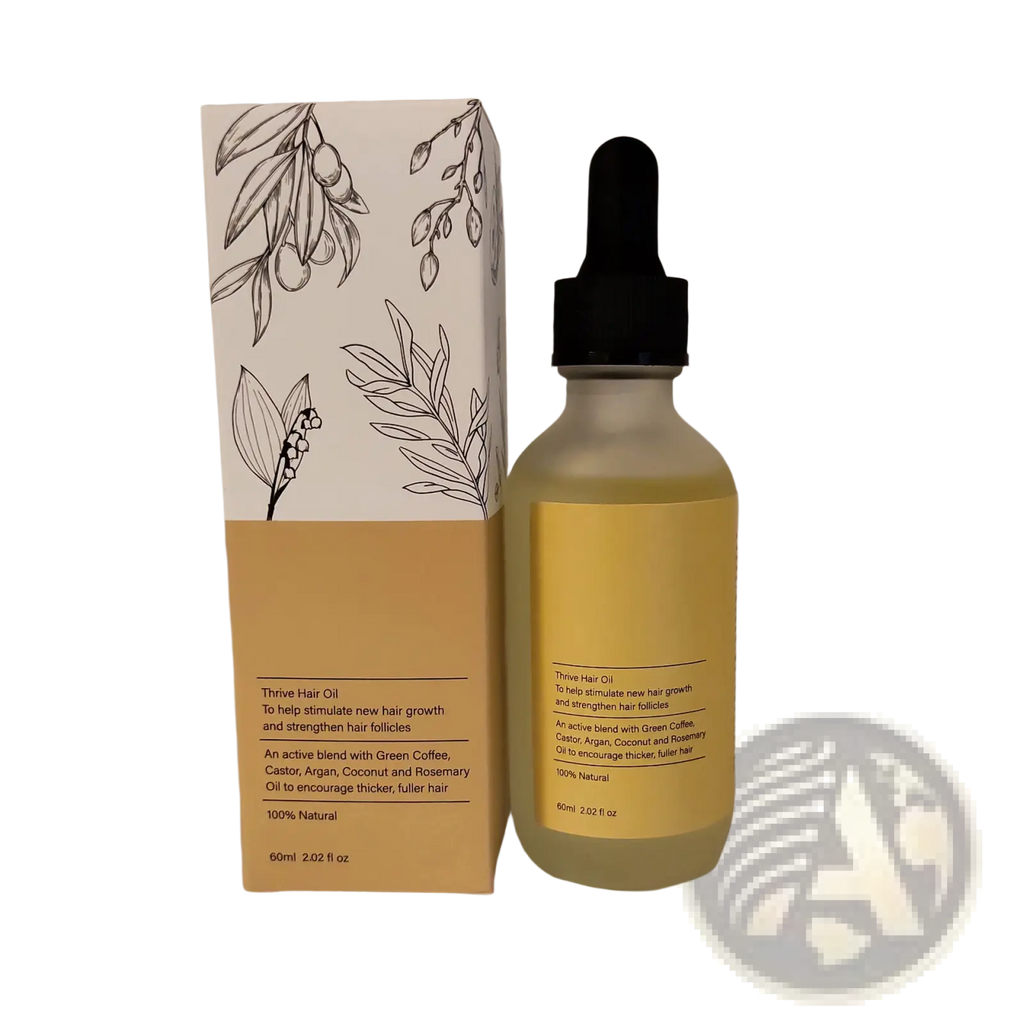 A clear glass bottle with black dropper cap and yellow label containing golden-yellow hair growth oil moisturizing repair serum 60ml