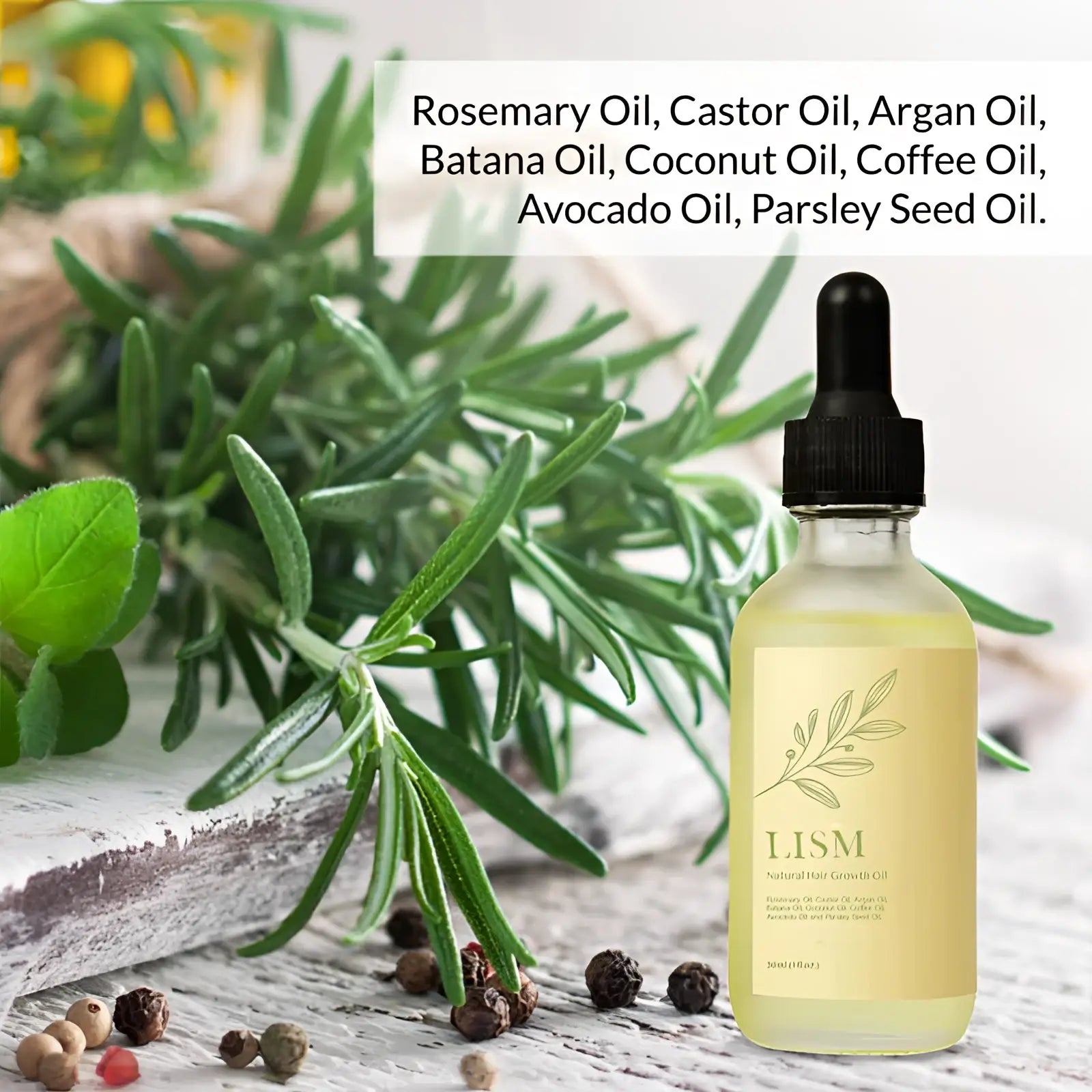 Clear glass bottle of iism natural hair growth oil with black dropper cap and pale yellow liquid for strong hair