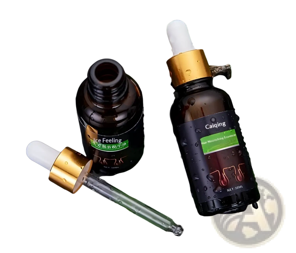 Dark brown glass hair growth serum bottles with gold caps and white droppers on a wet leafy surface