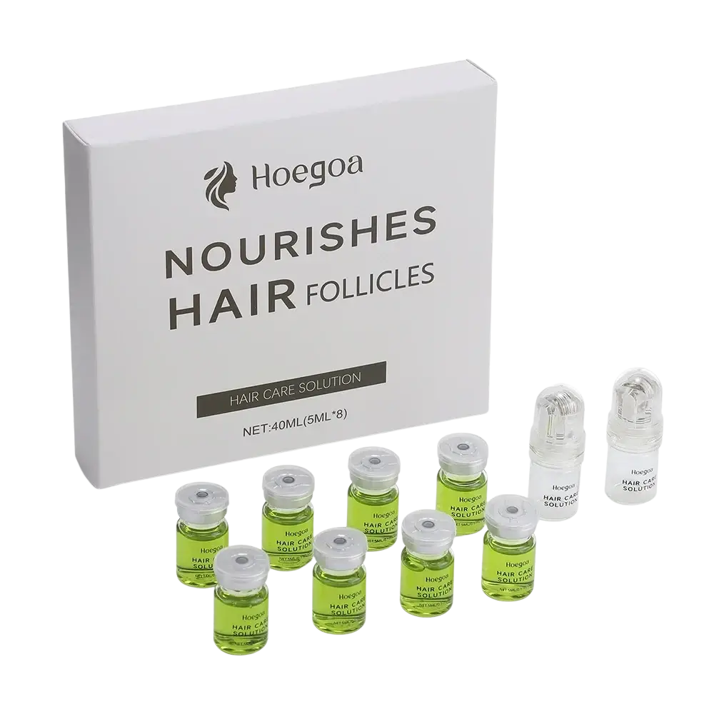 Hoegoa hair growth serum in clear glass vials with green liquid and white caps beside matching white box for scalp nourishment hair care solution