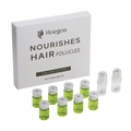 Hoegoa hair growth serum in clear glass vials with green liquid and white caps beside matching white box for scalp nourishment hair care solution