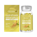 Shiny yellow hair oil capsules with ginseng and honey extract in a clear glass bottle with gold packaging
