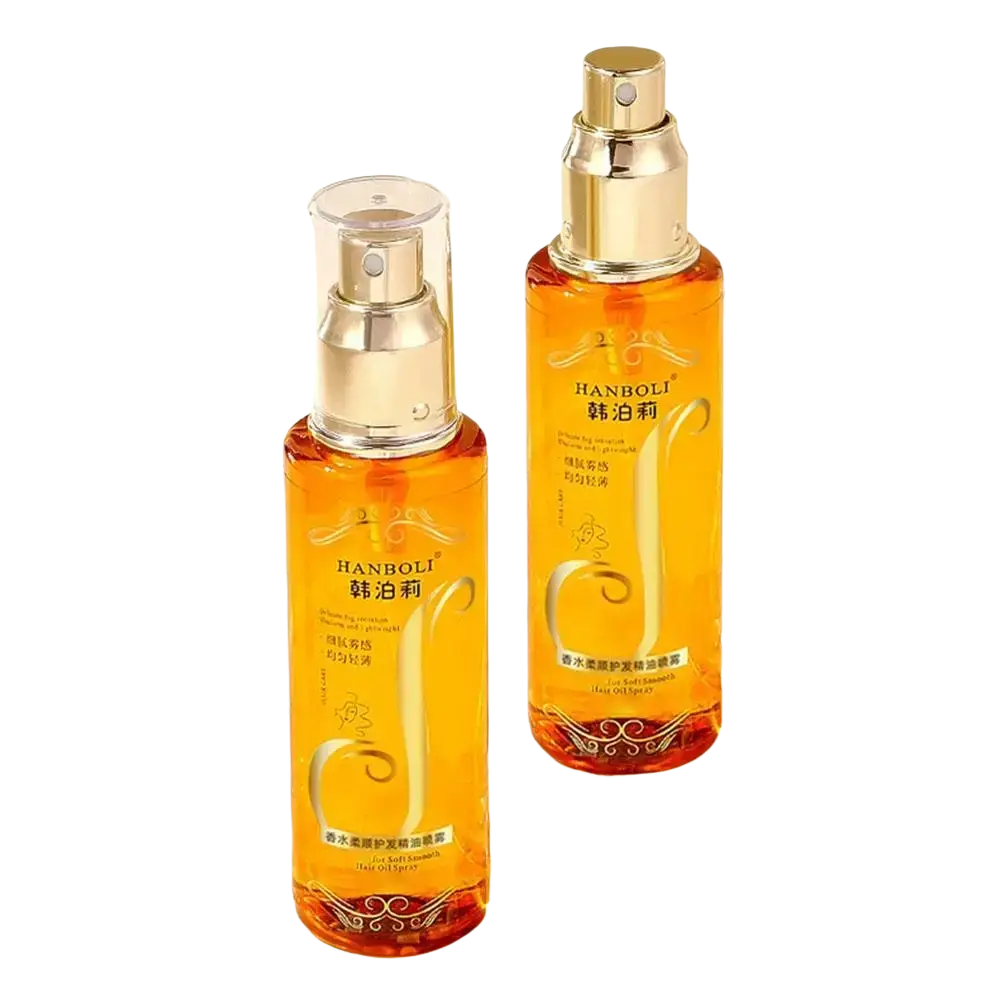 Two transparent glass bottles of amber hair oil spray with gold spray nozzles for frizz control and hydration