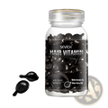 A clear glass bottle of sevich hair vitamin capsules containing 30 shiny black gel ampoules with a silver lid for repair and shine