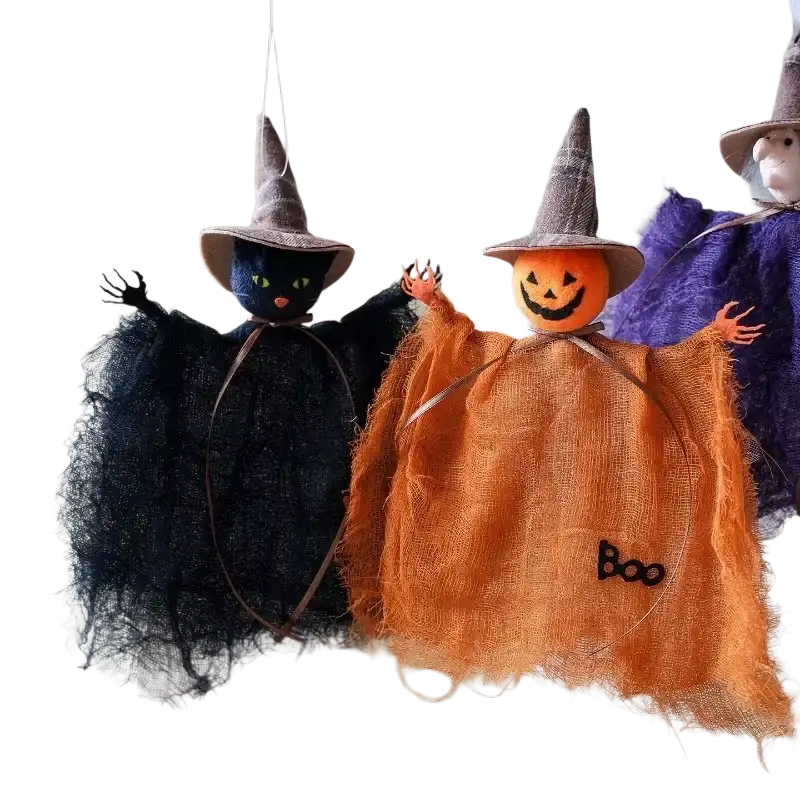 Orange witch halloween decoration pendant with pumpkin face black embroidered boo text and frayed fabric cape