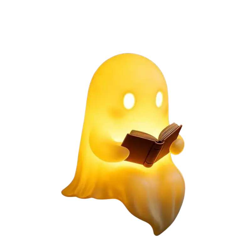 A glowing yellow halloween desktop luminous reading ghost lamp holding a book with illuminated eyes for decoration