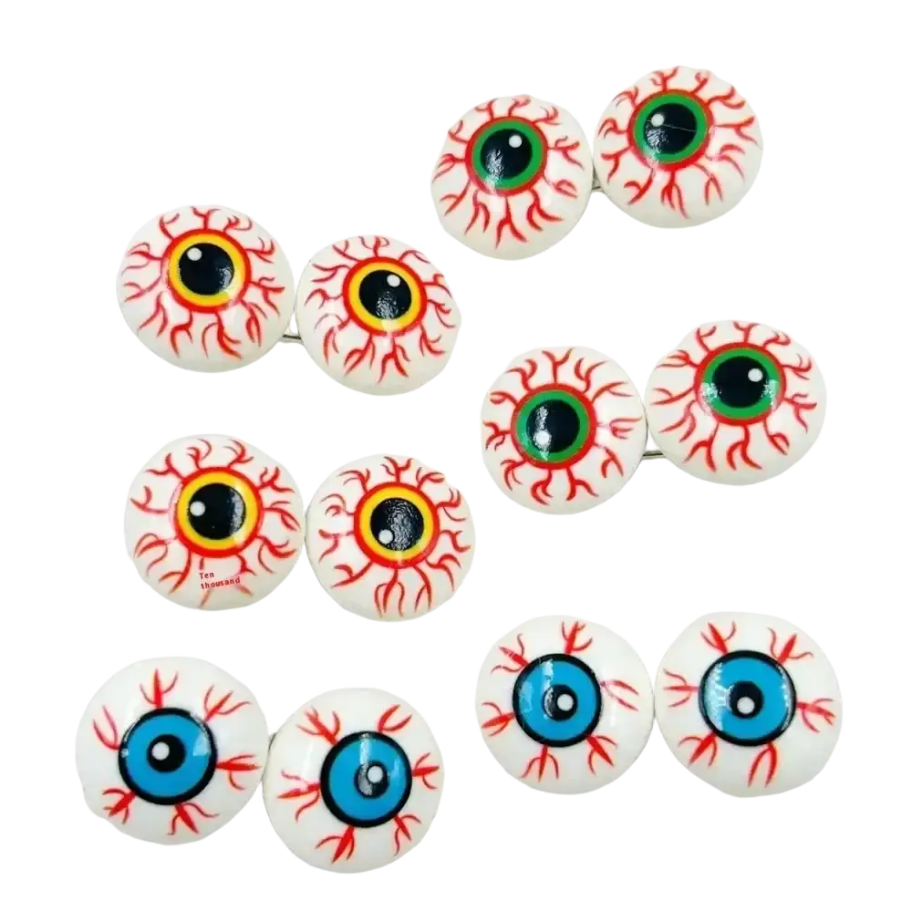Set of ten white plastic halloween eyeball ornaments with red blood vessel details and colorful irises in green yellow and blue