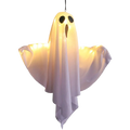 A glowing white halloween ghost light made of translucent fabric with black eyes and brown mouth for outdoor pathway decor