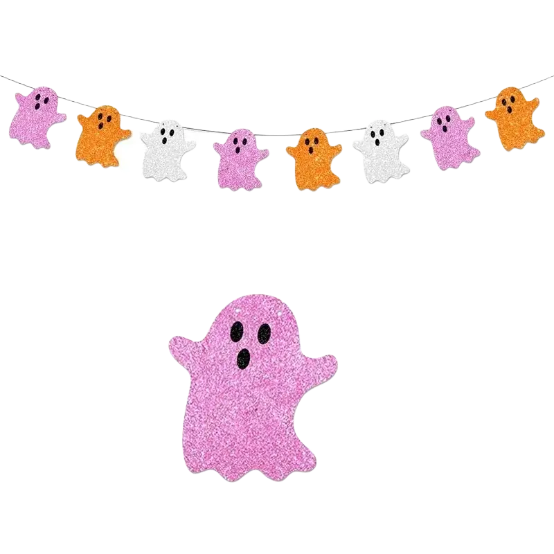 A glittery pink paper ghost decoration with black eyes in a halloween party glitter paper garland banner