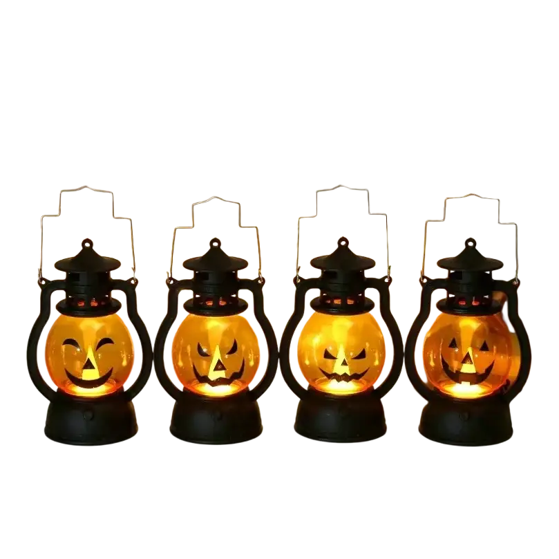 Four black plastic halloween party lanterns with glowing orange jack o lantern faces for halloween party decor