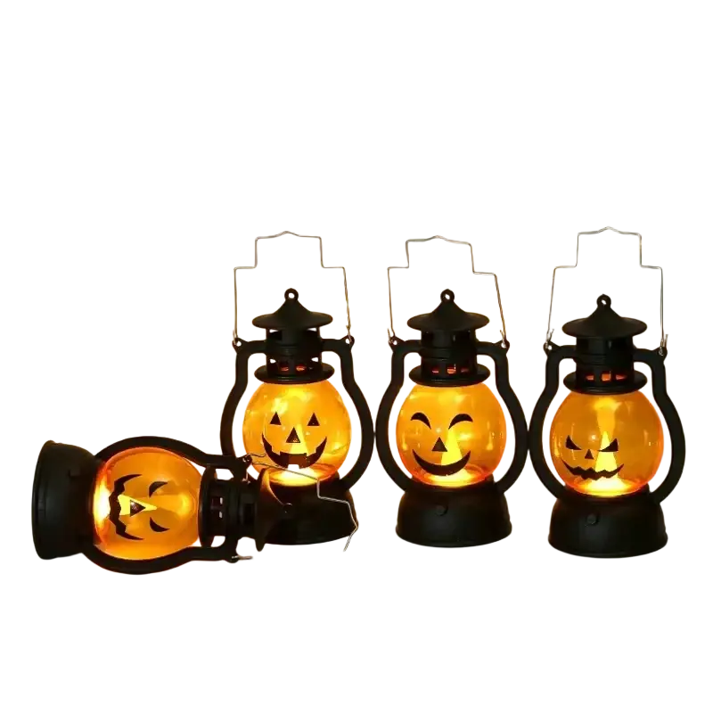 Set of three black plastic halloween party lanterns with glowing orange jack o lantern faces for halloween party decor