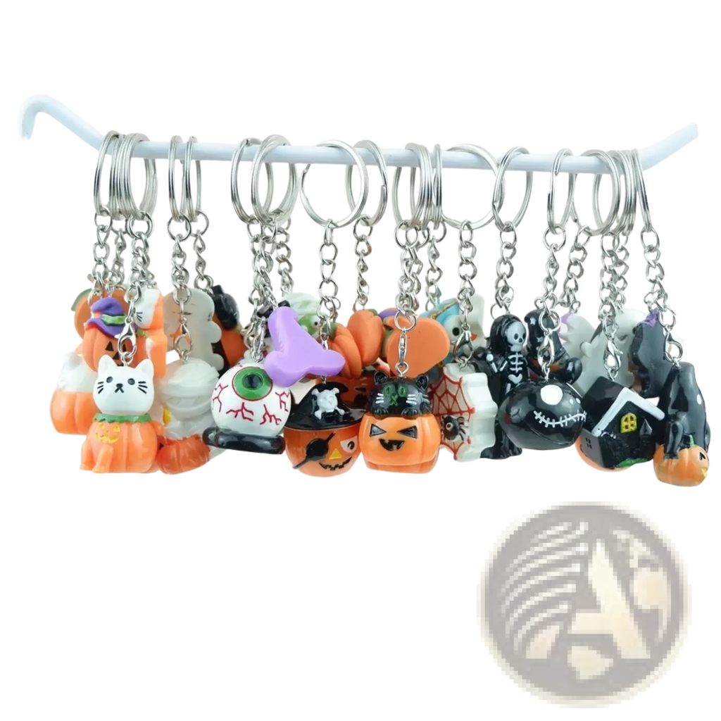 A collection of handmade resin halloween pumpkin keychains featuring miniature orange black white and purple charms