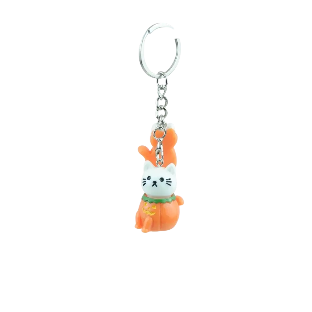Halloween pumpkin keychain handmade resin jewelry featuring a cute white cat with orange pumpkin body and green collar