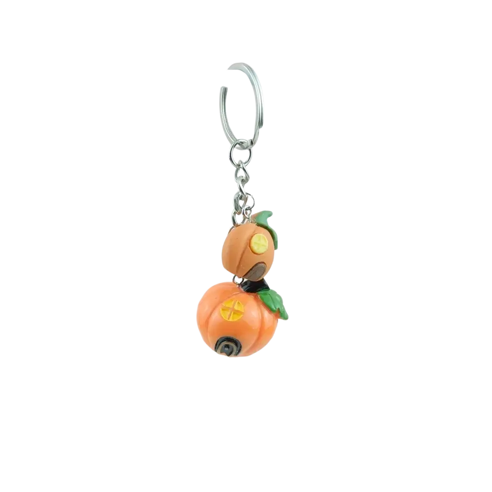Orange handmade resin Halloween pumpkin keychain with two stacked clay-like pumpkins and silver metal ring and chain