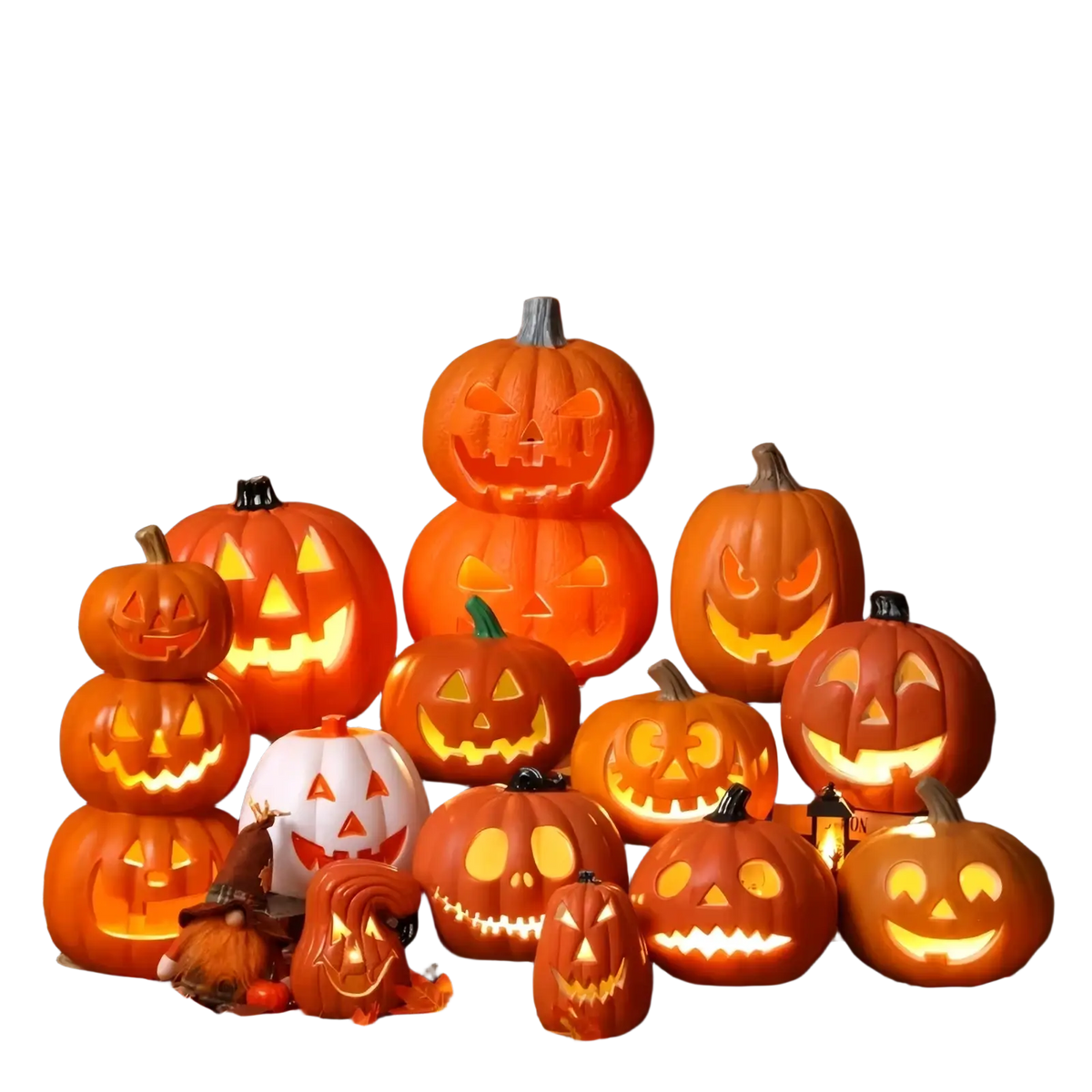 Halloween pumpkin lantern decoration featuring glowing orange and white carved pumpkins on autumn leaves
