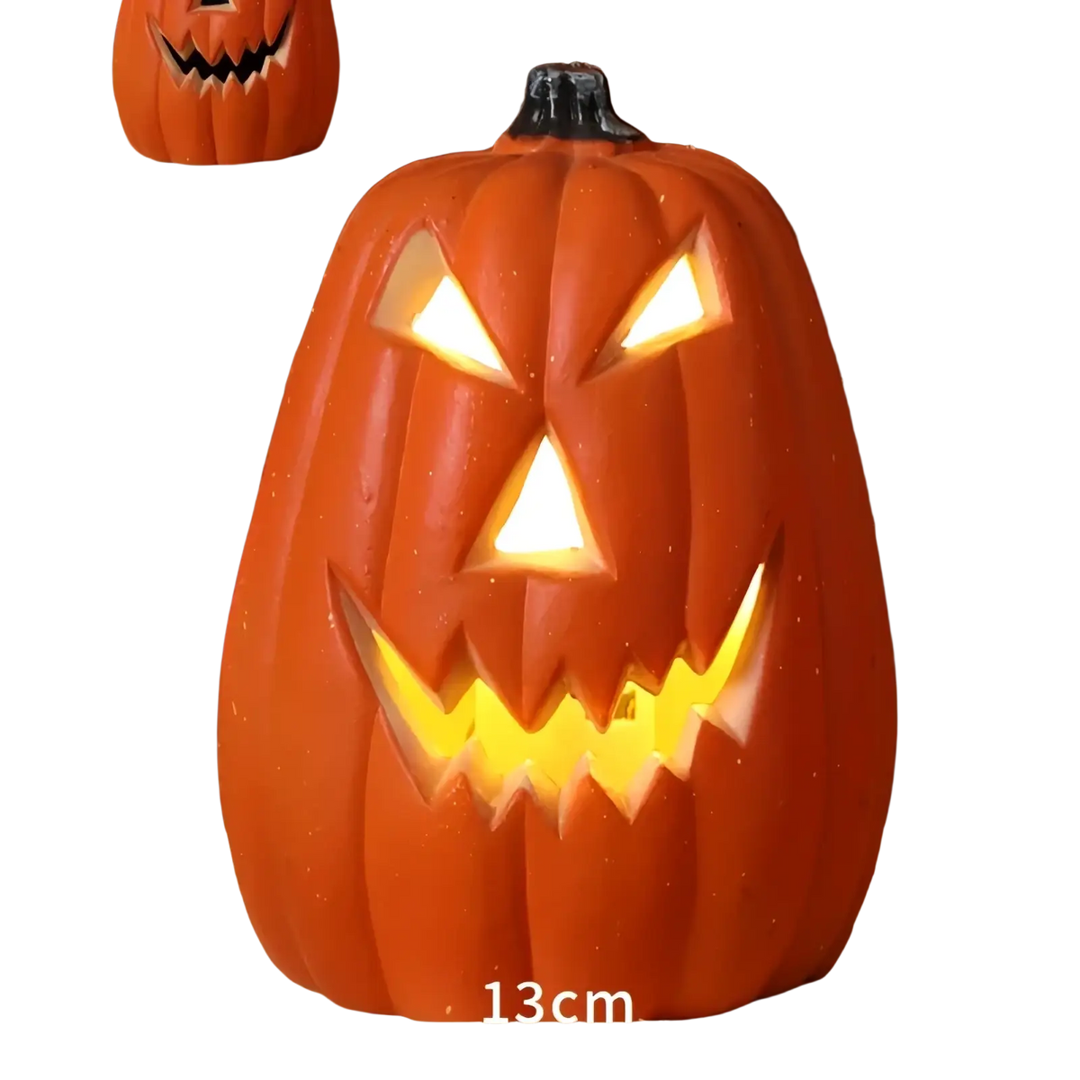Orange plastic halloween pumpkin lantern decoration with glowing yellow interior light and black stem