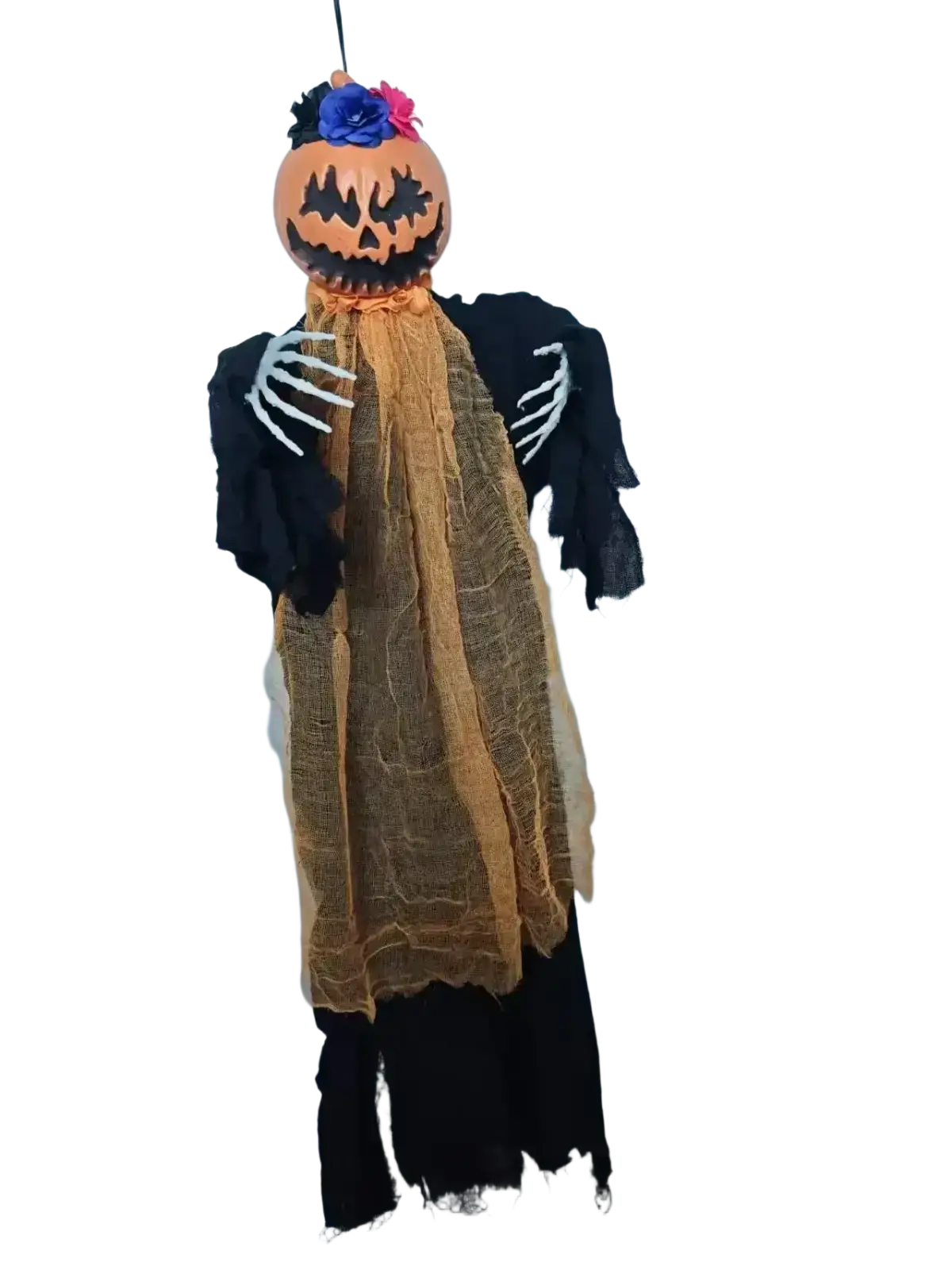 Orange pumpkin scarecrow hanging decoration with black fabric arms and tattered tan cloth body adorned with flowers